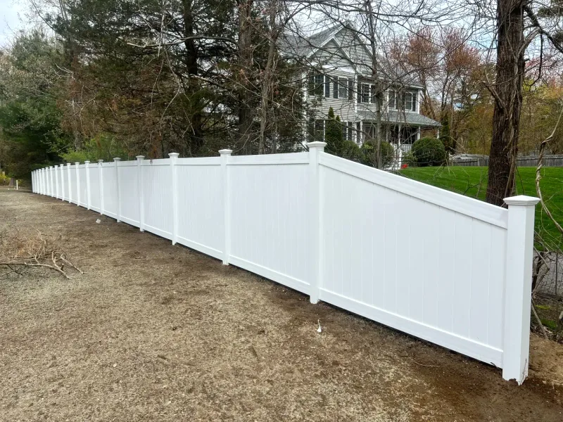 White vinyl property fence